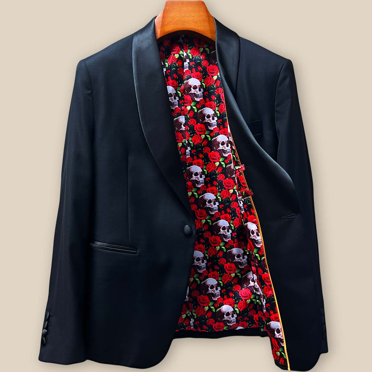 Interior view of left tuxedo jacket panel showing skull and rose flash lining and inner pocket construction