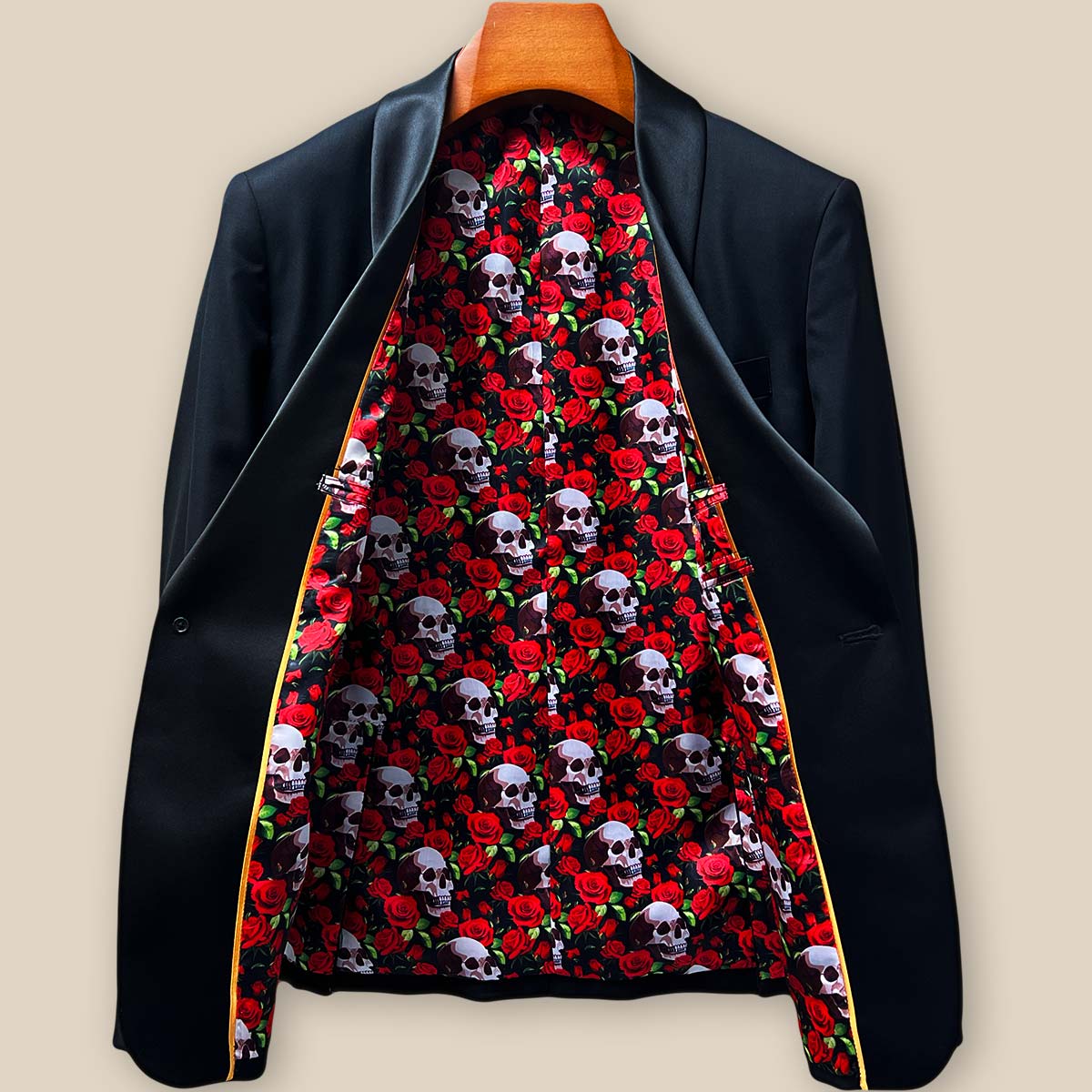 Full spread view of dramatic skull and rose flash lining against jet black wool exterior