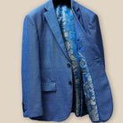 Interior view of light blue suit jacket showing blue and gold paisley flash lining on left side