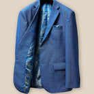 Interior view of light blue suit jacket showing blue and gold paisley flash lining on right side