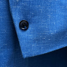 Close-up of suit sleeve showing single functional buttonhole, a unique feature of this custom Westwood Hart suit