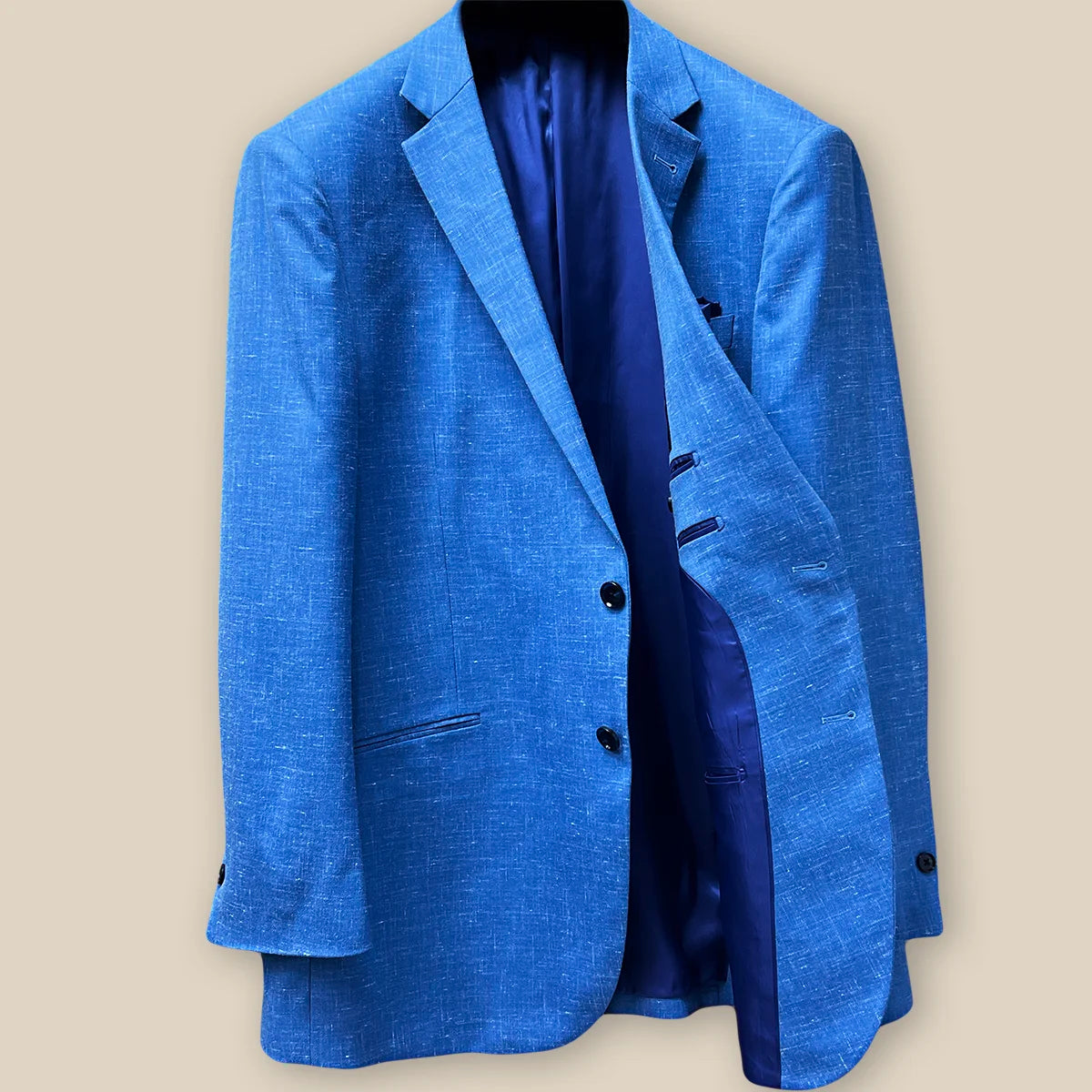 Interior view of light blue Westwood Hart suit jacket, showcasing medium blue silk bemberg lining and expert craftsmanship