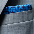 Close-up of suit jacket breast pocket with coordinating built-in pocket square