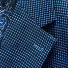 Classic notch lapel detail on medium blue micro check sport coat showing hand pick stitching and navy geometric pattern