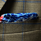 Upper chest view of sport coat showcasing built-in pocket square in complementary blue shade