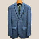 Close-up view of medium steel blue hopsack sport coat showing olive green contrast accent buttonhole with hand-finished stitching detail