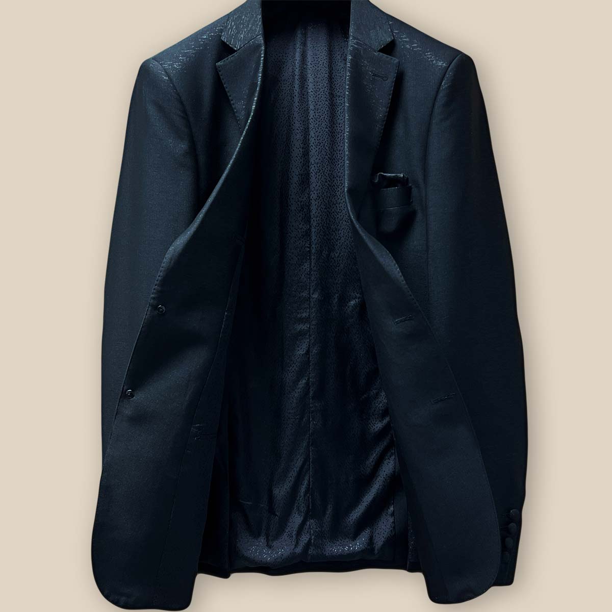 Detailed look at the luxurious lining inside the westwood hart men's shiny black glitter tuxedo jacket, ideal formalwear for black tie events.