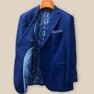 Interior right side of navy blue geometric textured suit jacket revealing paisley lining and internal construction details
