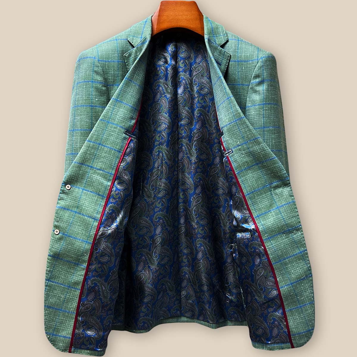 Full interior lining display showing blue paisley pattern with maroon piping details and Westwood Hart branded interior label
