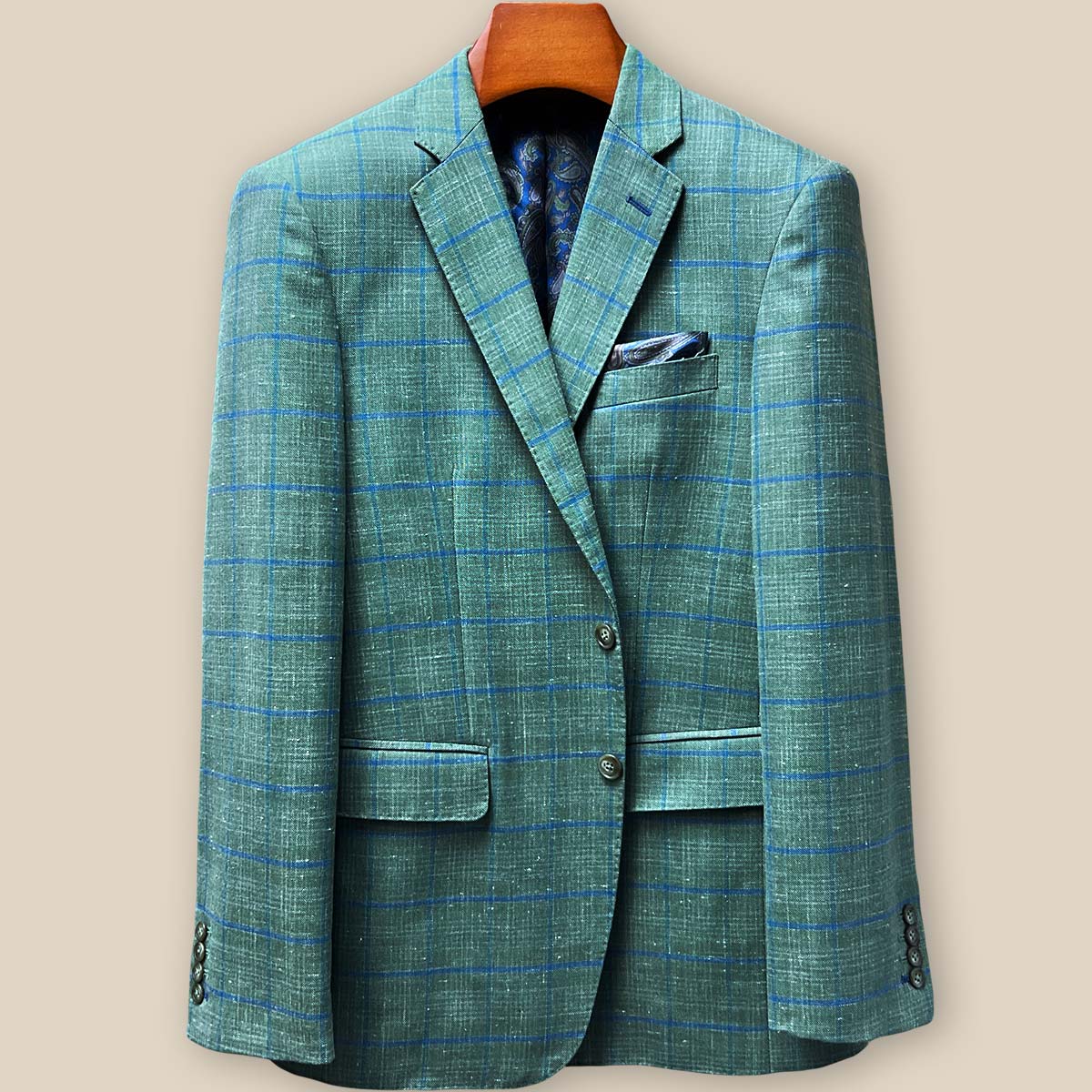 Front button stance displaying olive green horn buttons against windowpane fabric with precise spacing and professional finishing
