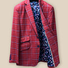 Inside left view of the sport coat, highlighting the navy lining with pink and blue floral accents.