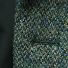 Macro shot of hand-stitched buttonhole detail showing thread color and precision