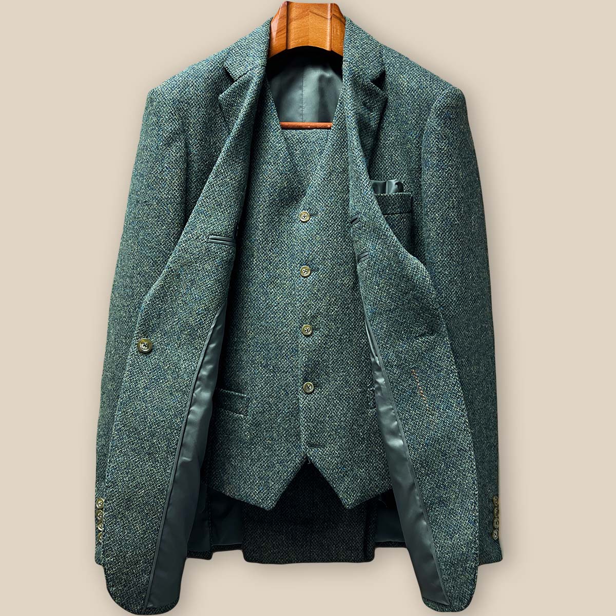 Complete view of sage green tweed sport coat displaying overall silhouette and self-textured fabric detail