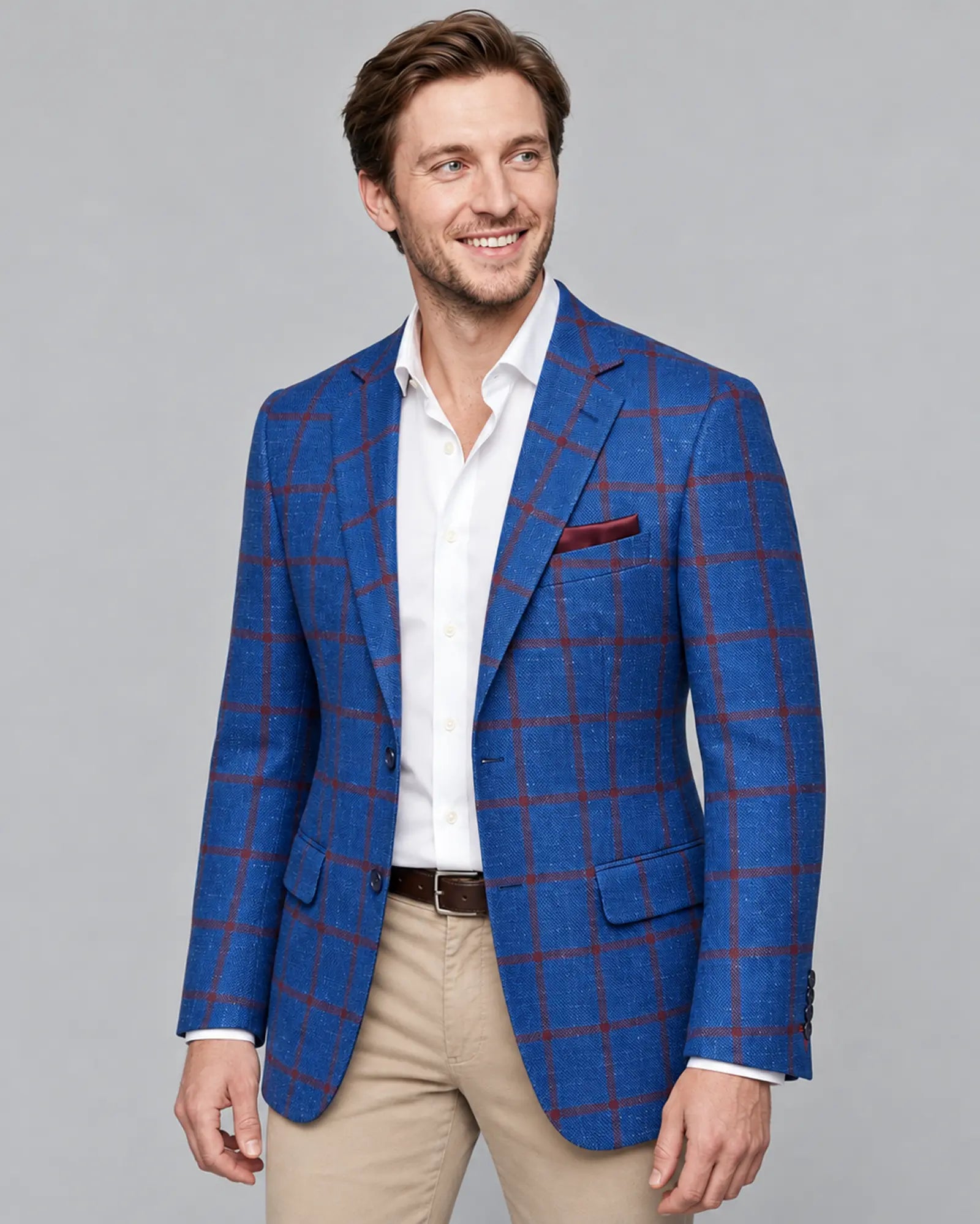 Side model view of bright royal blue windowpane men's sport coat showing the side profile and natural drape