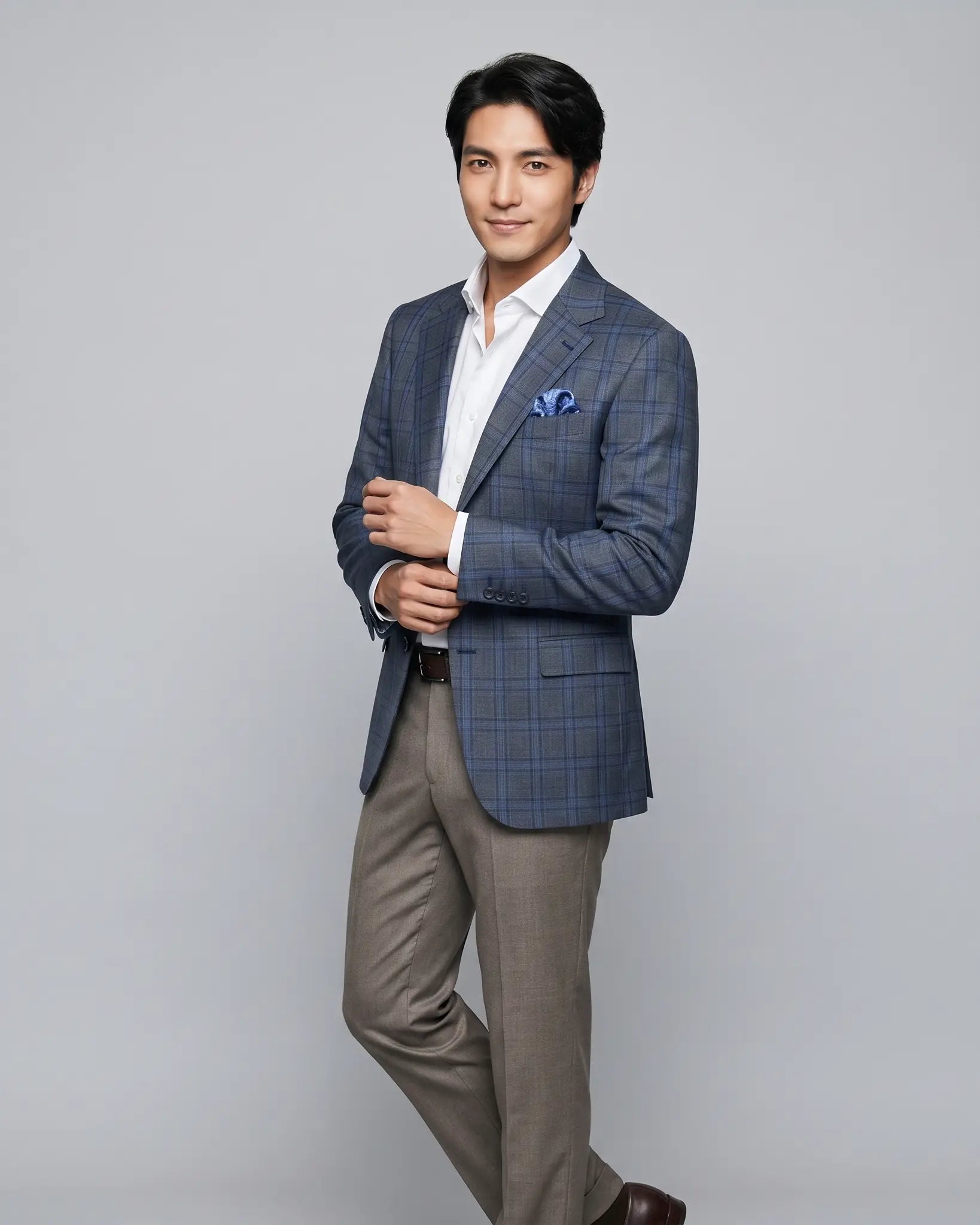 Alternate model view of charcoal grey royal blue windowpane men's sport coat showing side styling
