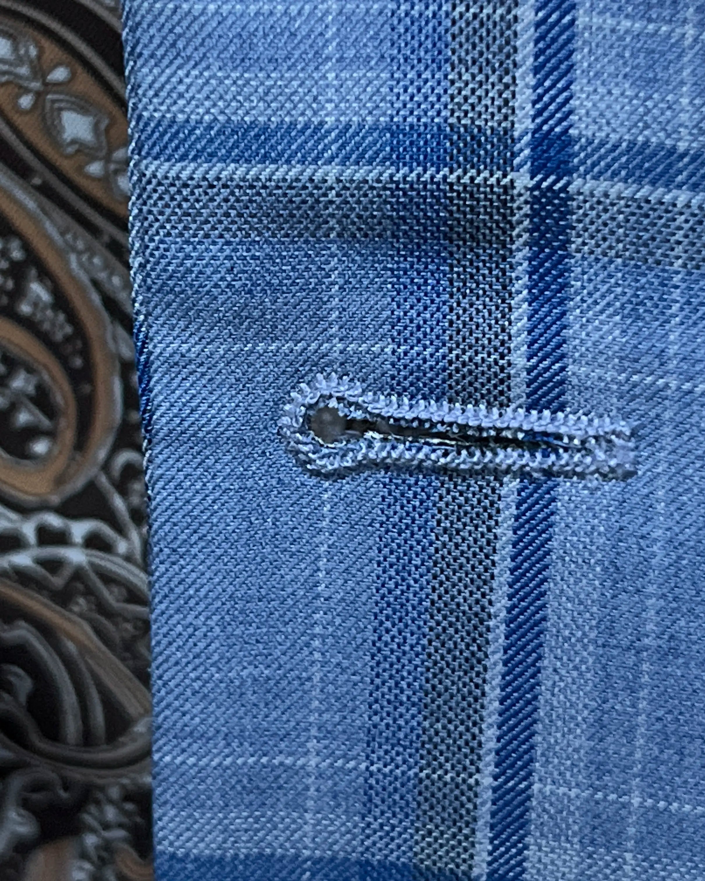 Front buttonhole detail of Cornflower Blue Windowpane men's sport coat showing the front buttonhole finish