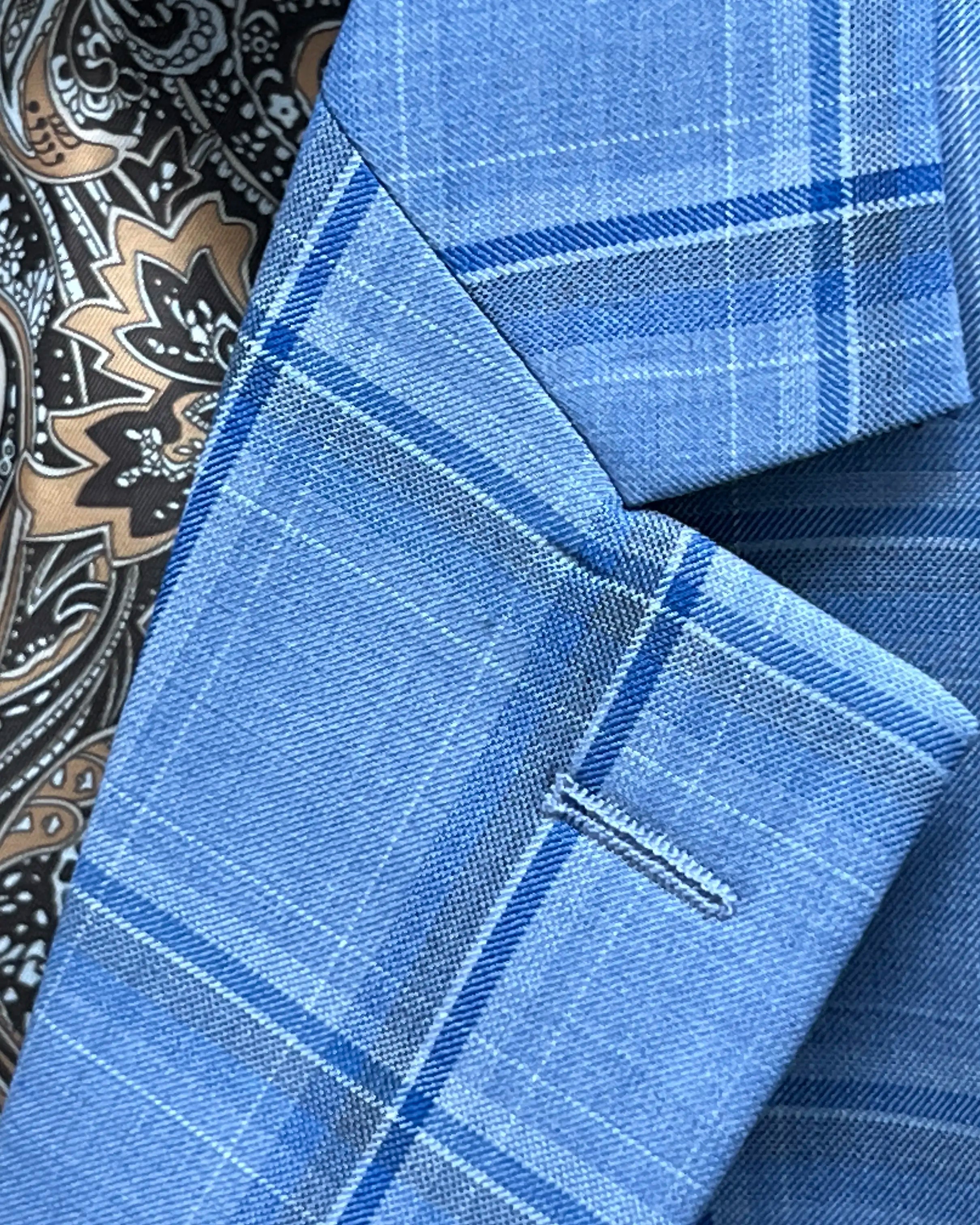 Lapel detail of Cornflower Blue Windowpane men's sport coat showing the standard lapel buttonhole