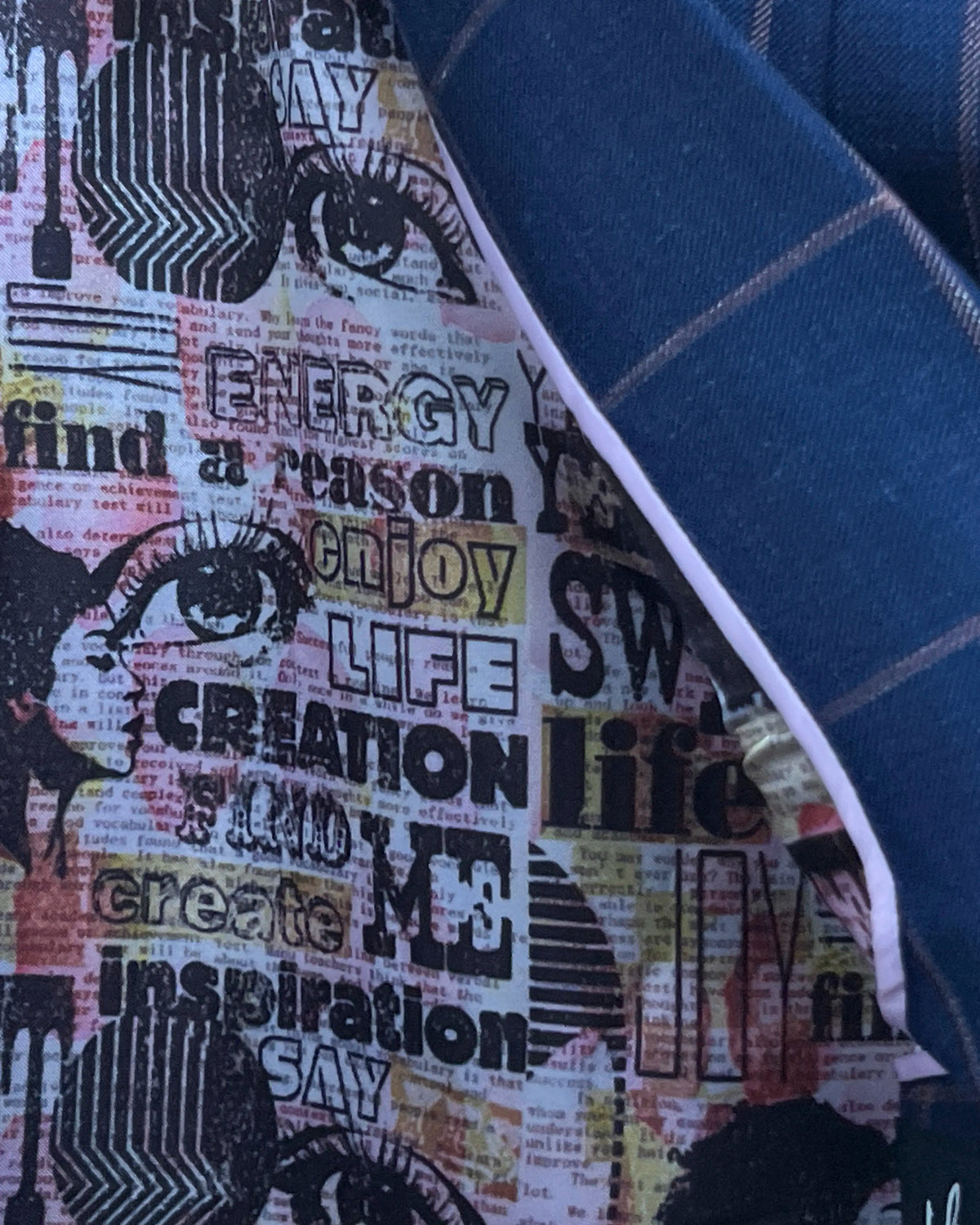 Interior lining detail of Royal Blue Crimson Windowpane men's sport coat showing the printed lining design