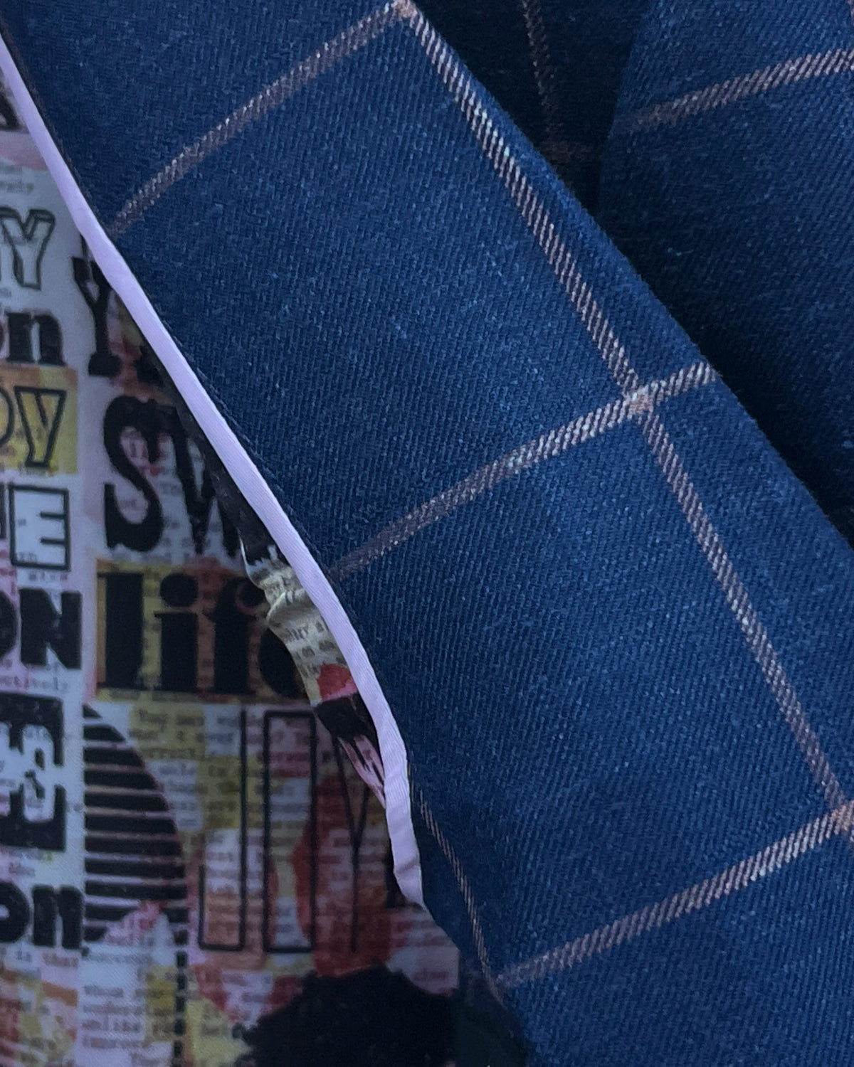 Fabric texture detail of Royal Blue Crimson Windowpane men's sport coat showing the wool and linen blend cloth surface