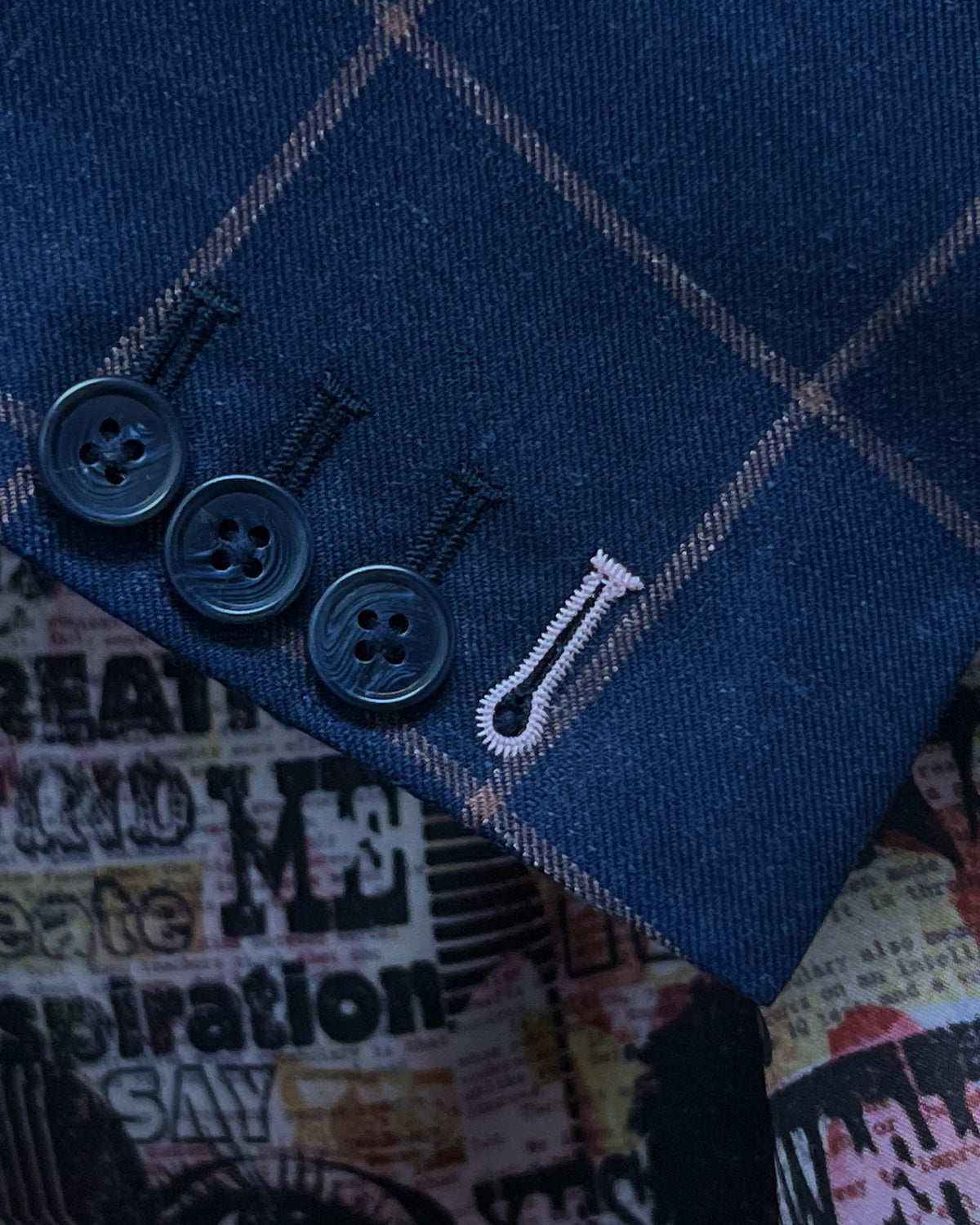 Sleeve cuff detail of Royal Blue Crimson Windowpane men's sport coat showing functional sleeve buttons and the contrast last buttonhole