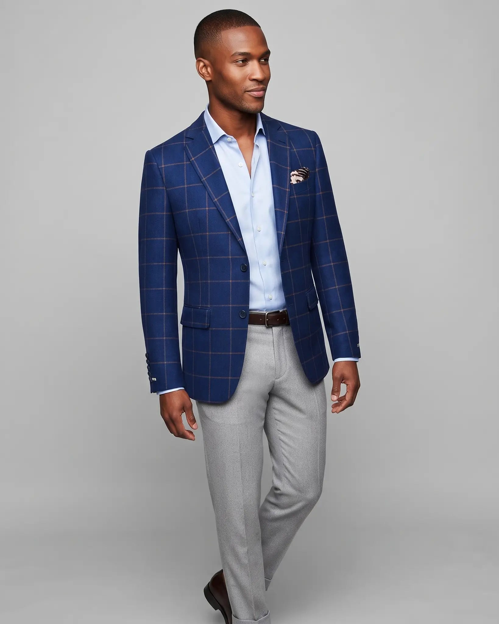 Angled model view of Royal Blue Crimson Windowpane men's sport coat showing natural drape and side facing editorial styling