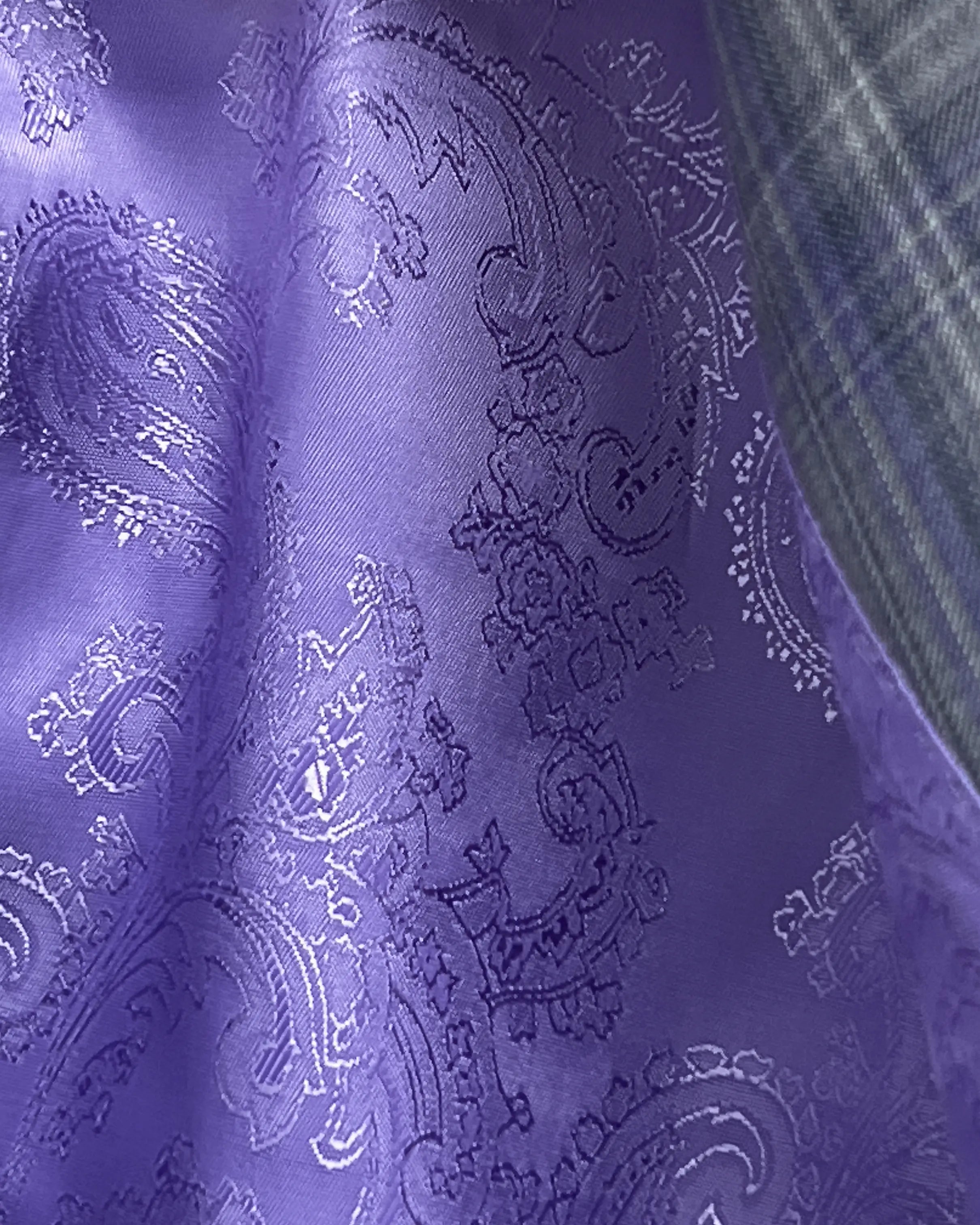 Interior lining view of Steel Grey Windowpane men's sport coat showing the purple paisley lining design and silky finish.