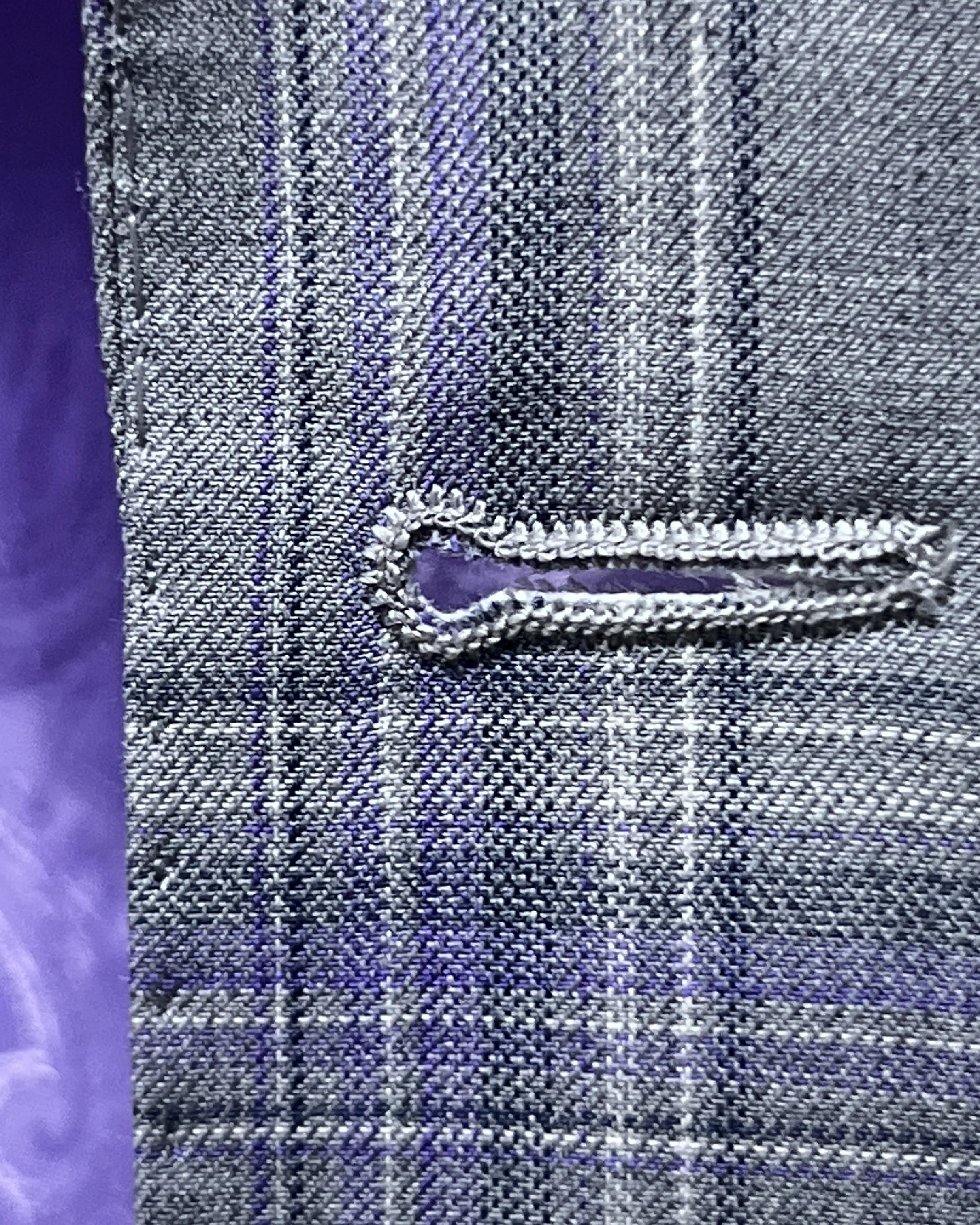 Front buttonhole close up of Steel Grey Windowpane men's sport coat showing clean tailored buttonhole construction.