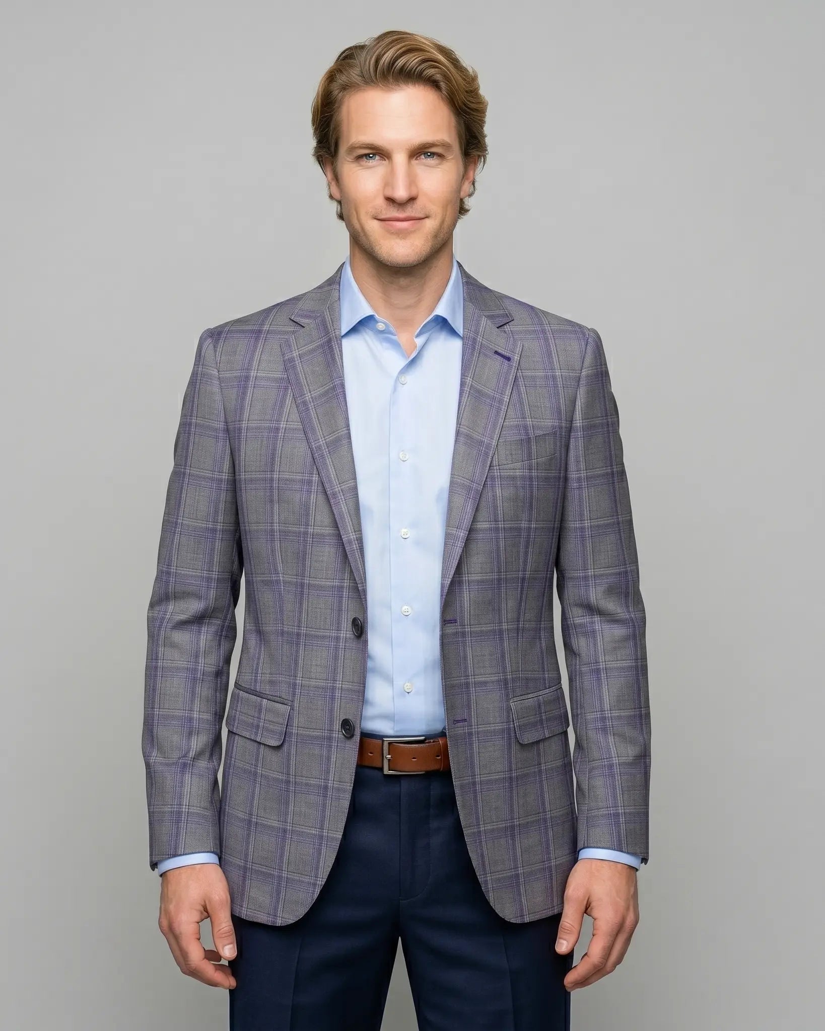 Front model view of Steel Grey Windowpane men's sport coat showing the full front silhouette, notch lapels, straight flap pockets, and matching pocket square.