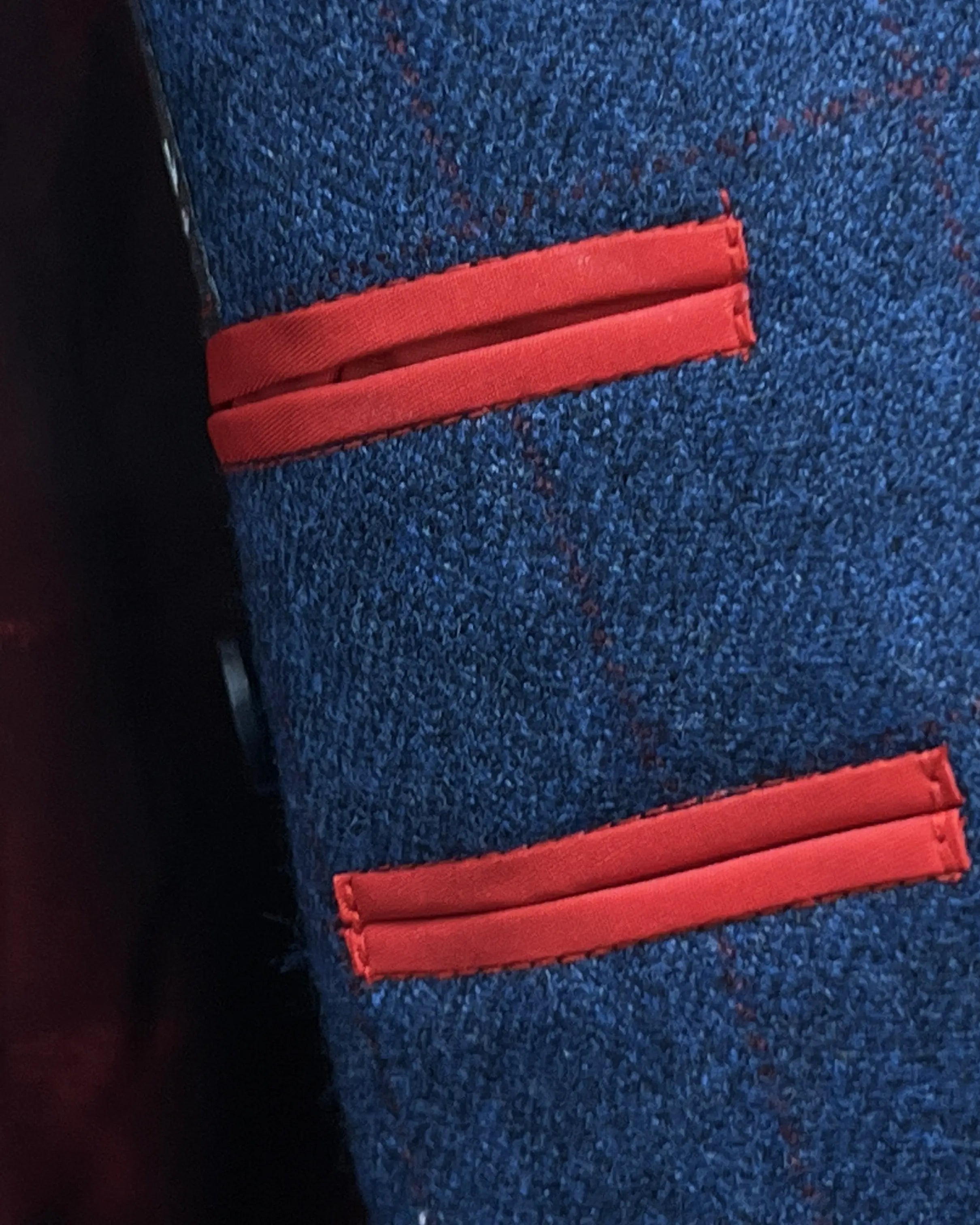 Brand detail of teal blue with red windowpane men's sport coat showing the Westwood Hart mill label reference