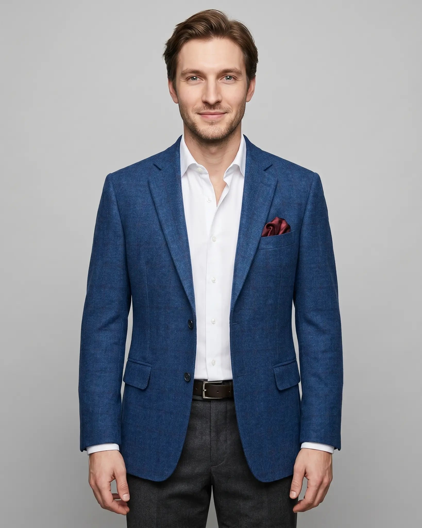Front view of teal blue with red windowpane men's sport coat showing the full front hero editorial look