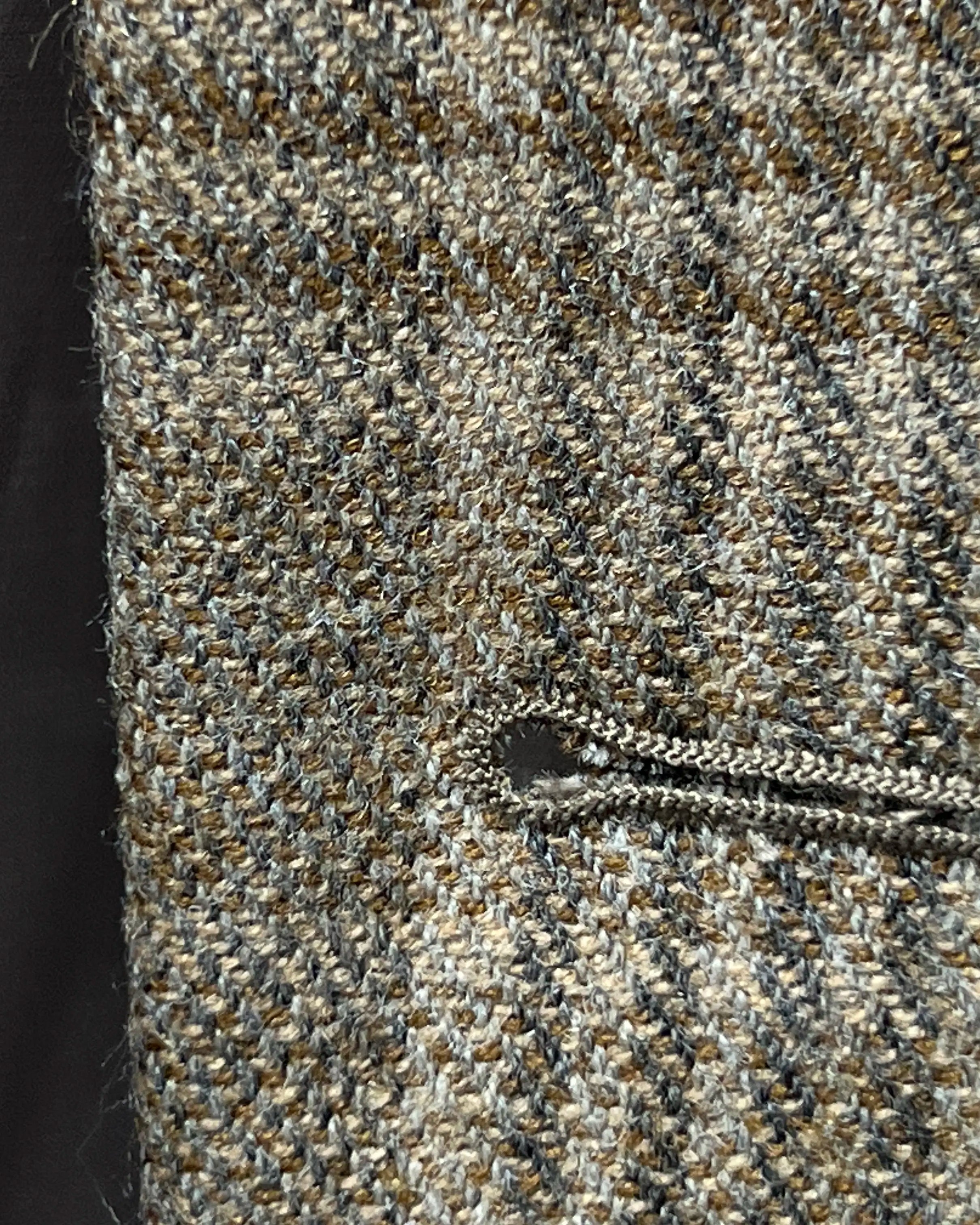 Front buttonhole detail of Warm Taupe Textured Check men's sport coat showing the main front buttonhole finish