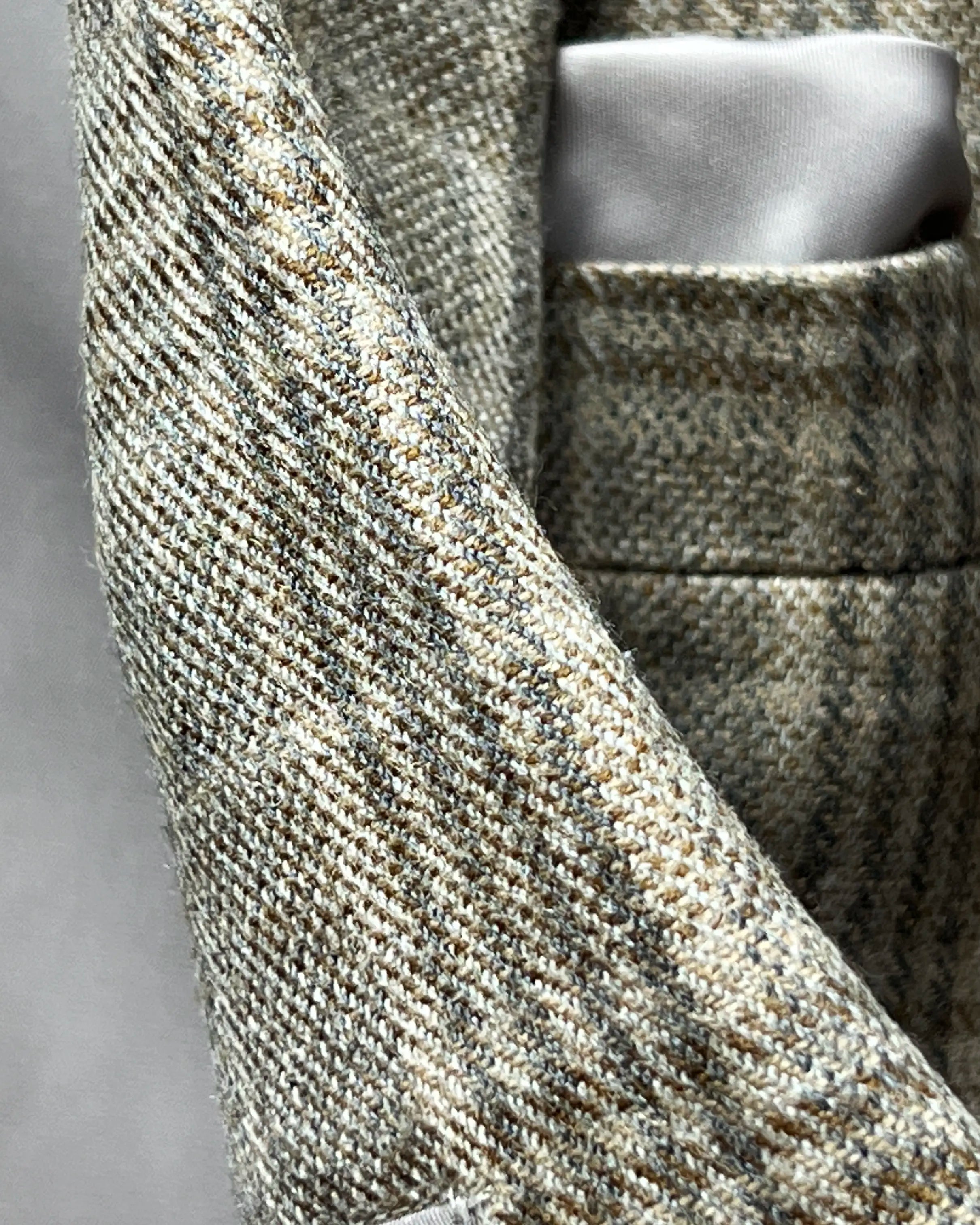 Fabric close up of Warm Taupe Textured Check men's sport coat showing the tweed texture and cloth character