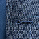 Macro shot of hand-finished buttonhole stitching detail