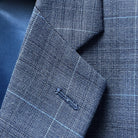 Close-up of notch lapel construction showing fabric pattern alignment