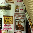 Colorful flash lining detail visible at jacket cuffs and vents in wine labels and wine bottles print pattern