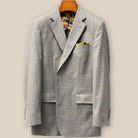 Close-up view of tan blue windowpane sport coat showing contrast sky blue accent buttonhole with hand-finished stitching detail