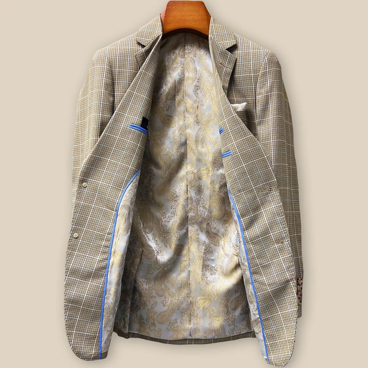 Full interior view of custom sport coat showcasing luxurious champagne gold paisley lining with Westwood Hart branding