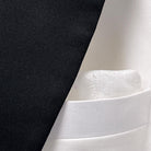 Formal wear by Westwood Hart in white wool, tailored using 100% Australian Merino wool and black grosgrain trimming.