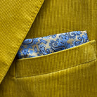 Breast pocket of warm mustard yellow corduroy sport coat with built-in pocket square holder and hand-finished edges