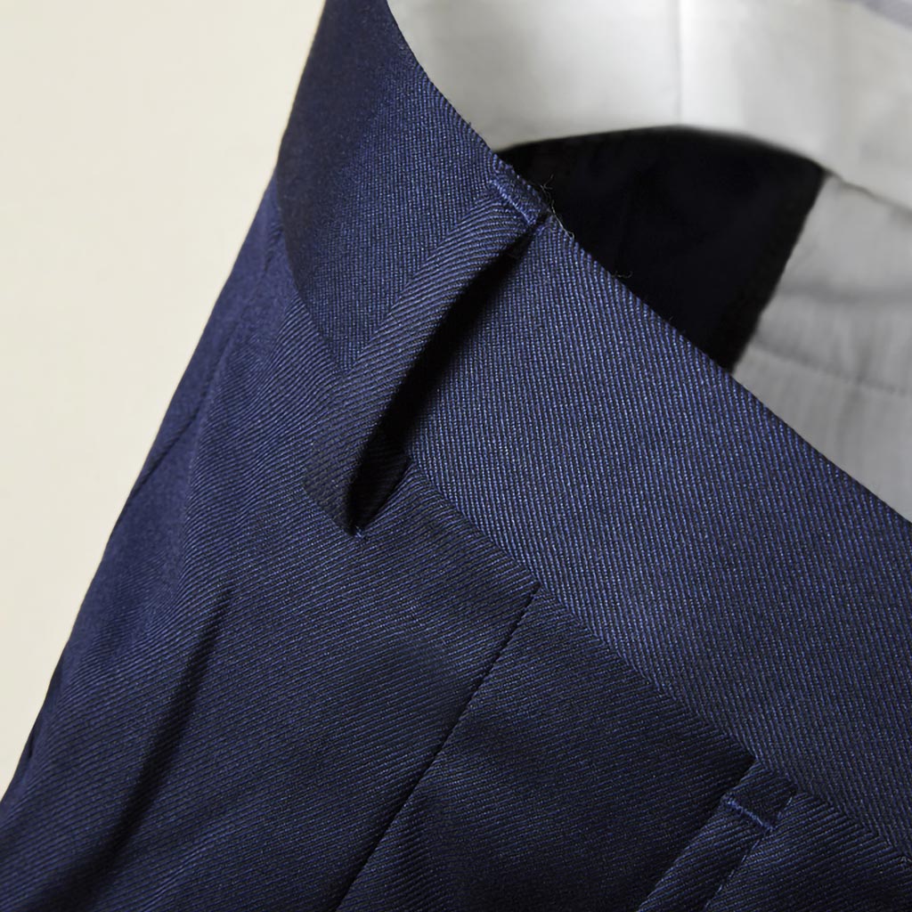 Online suit design: plain weave navy men's trousers, front pocket and belt loop details
