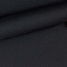 Close-up of the plain weave fabric on a custom suit for online design