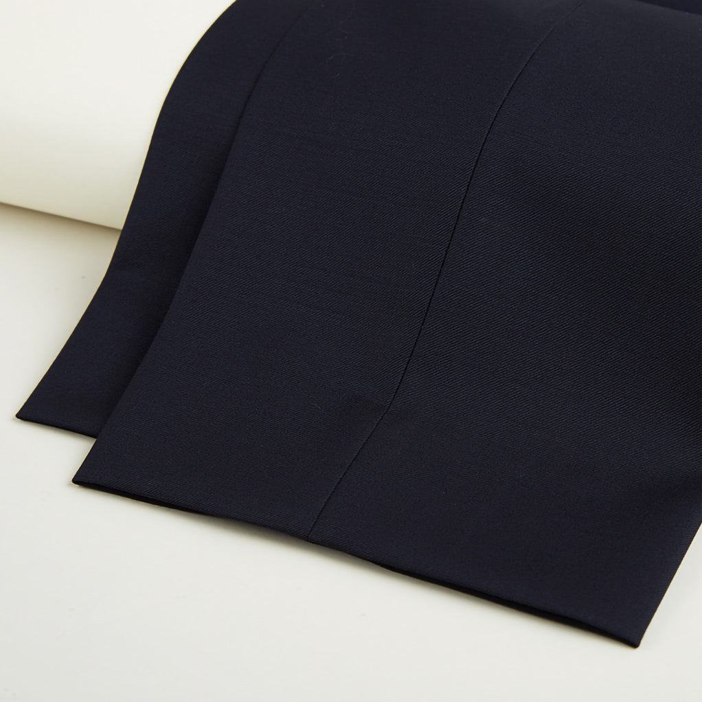 Plain weave black men's suit, rear view showcasing custom tailoring and online suit design