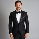 Westwood Hart's classic black, custom tailor-made suit, perfect for all seasons. Crafted from 'Black Plain Weave' wool fabric, it's a groom's first choice for wedding attire.